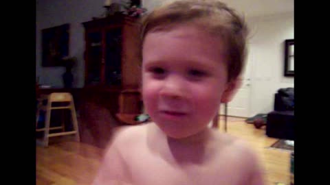 Sour kumquat causes cute kid to make sour face