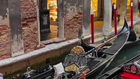 TAKING A ROMANTIC GONDOLA RIDE IN VENICE