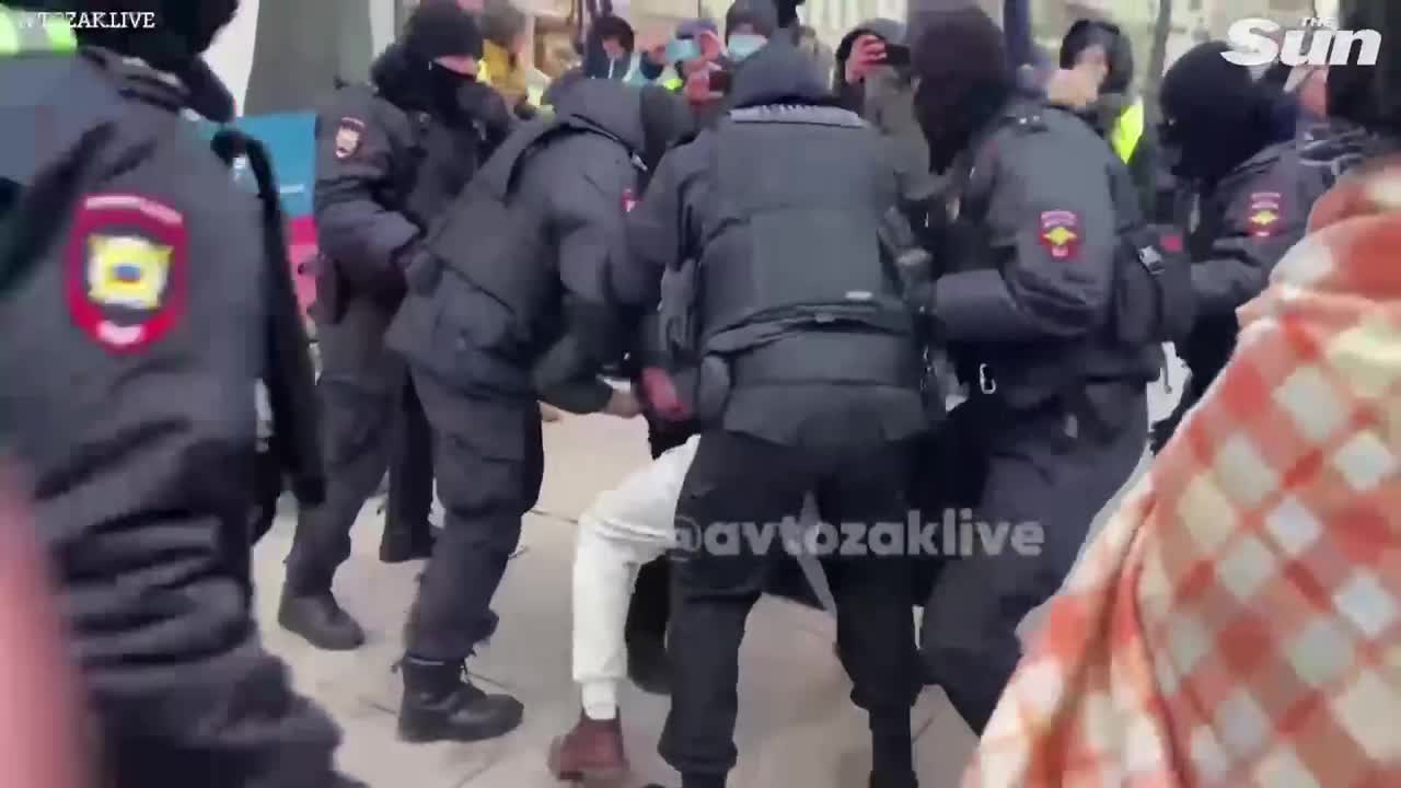 Russian police detain woman with flower protesting war on International Women's Day