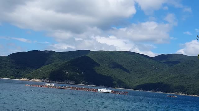 Peaceful countryside mountains and sea