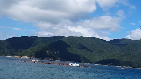 Peaceful countryside mountains and sea