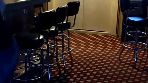 Dive bar drunk attempts back flip