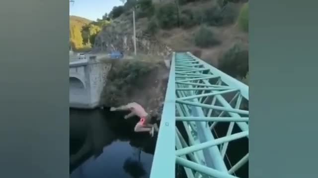 Man slips and falls off the bridge, He could have avoided it.