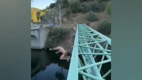 Man slips and falls off the bridge, He could have avoided it.