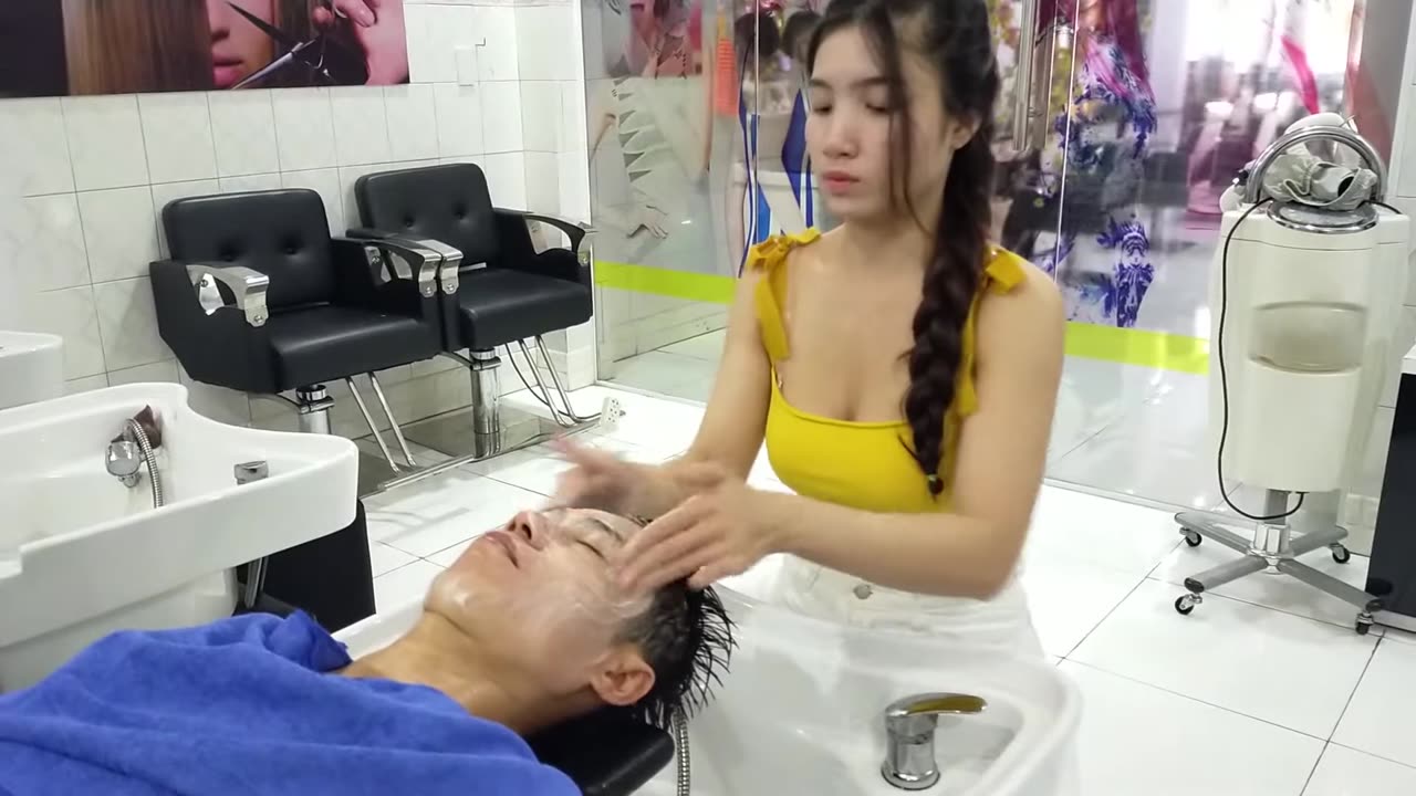 This week's most popular relaxing shampoo video, Vietnamese barbershop