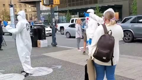 People give free hugs in spite of pandemic in Vancouver, Canada