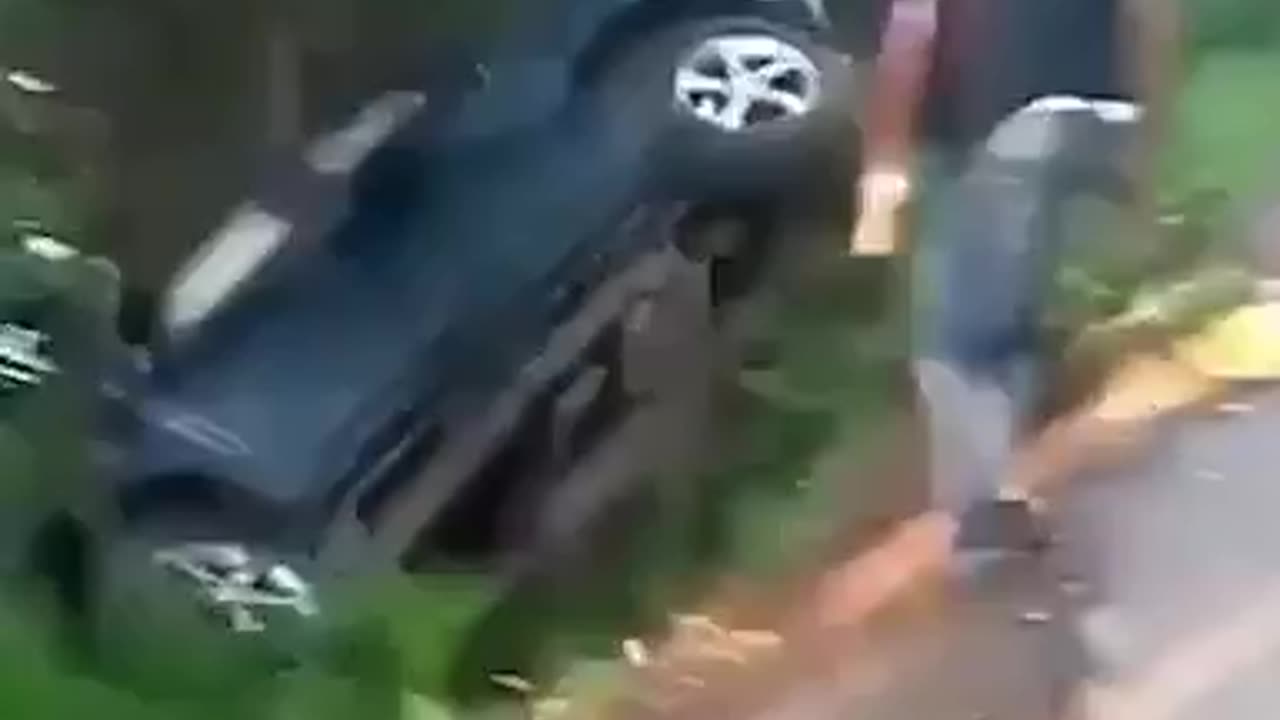 trying to save a car from rolling down the mountain failed