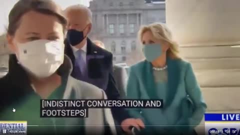 Joe Biden hears someone (in his ear) tell him to Salute the Marines (instead he just says the words)