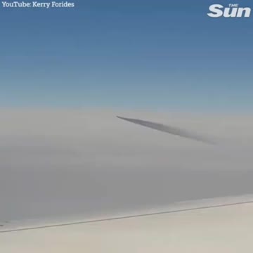 Passenger spots a strange moving UFO mid-flight