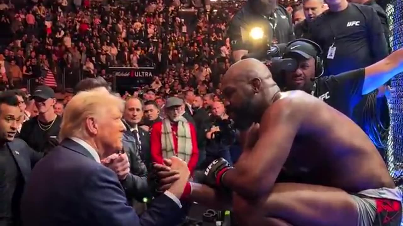 Jon Jones gives UFC title belt to Donald Trump, after his win