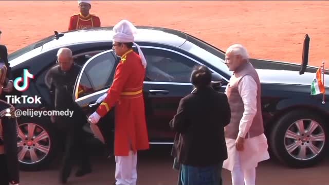 Uhuru _See how Uhuru kenyatta welcomed in Indian like a king, with military gun shots.