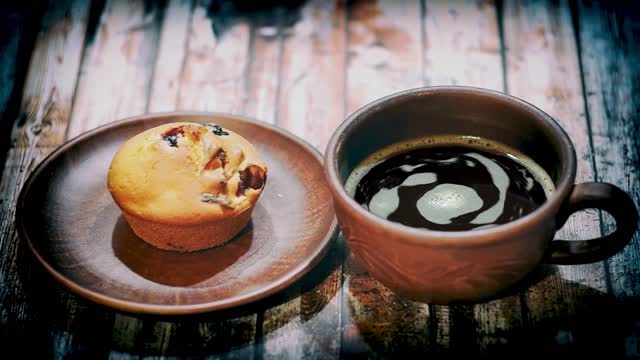 Muffin And Black Coffee For Breakfast .