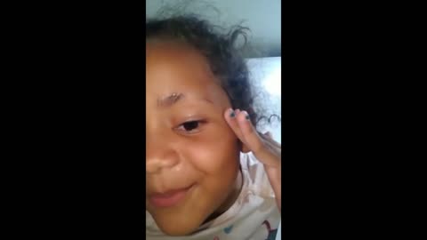 Little girl records herself shaving off an eyebrow