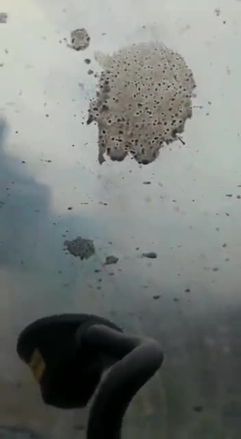 The battle between protesters and French police in Sainte-Soline yesterday filmed from a police van.