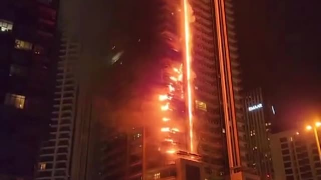 One resident said the fire spread quickly through exterior cladding