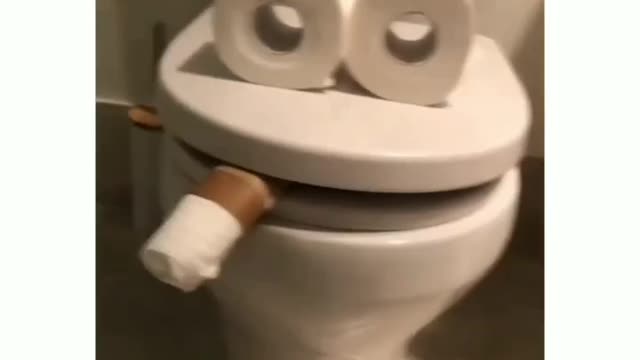 Funny crazy Guy doing fun with paper at bathroom!! lol