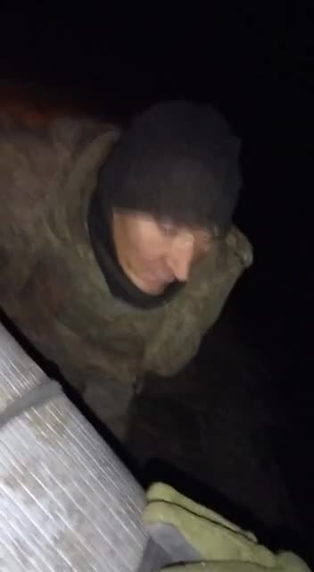 Moving Back Russian POWs Under Fire