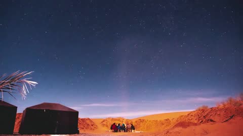 Time lapse of people camping with starry sky Stock Footage FREE