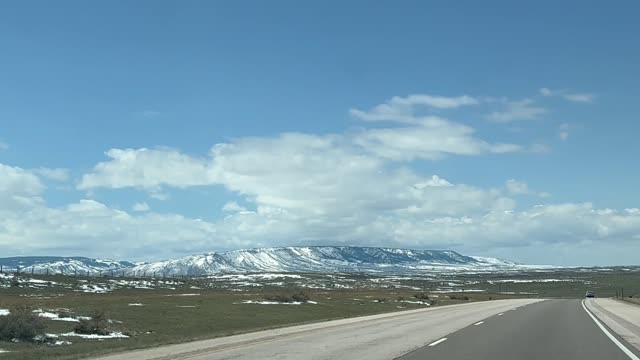 North on I-25, Wyoming, snow in April 2022