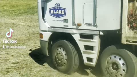 Moving silage bales