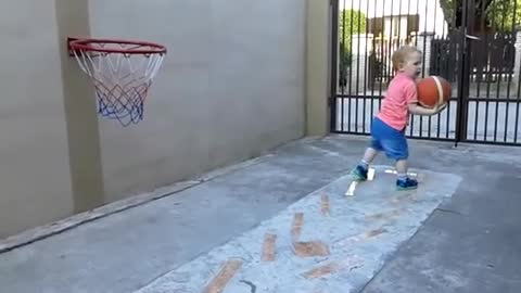 baby playing basketball, amazing