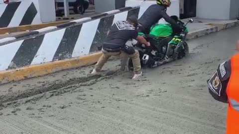 Motorcycle Gets Stuck in Wet Concrete