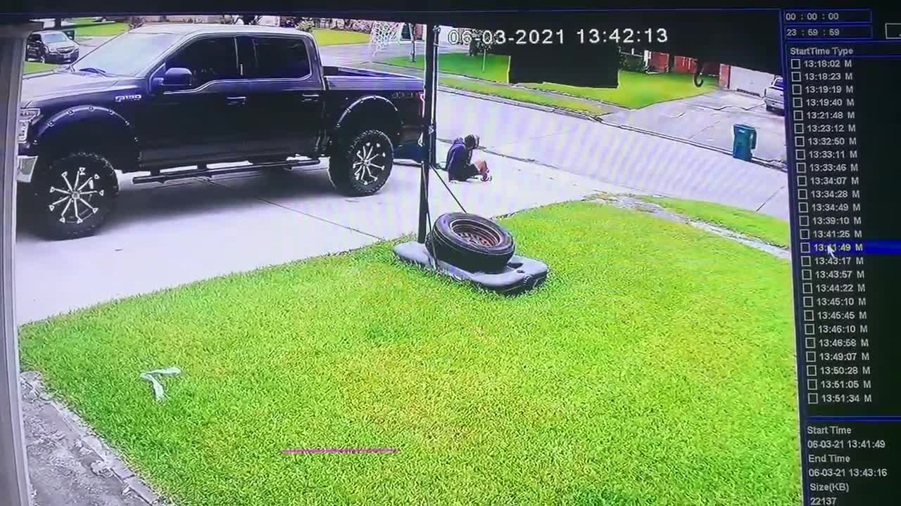 Boy Trips On Garbage Bin's Lid And Falls Down While Pushing It On Driveway