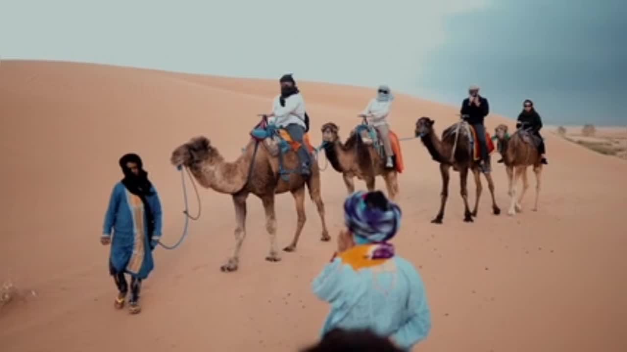 Camel riding in the desert in Morocco