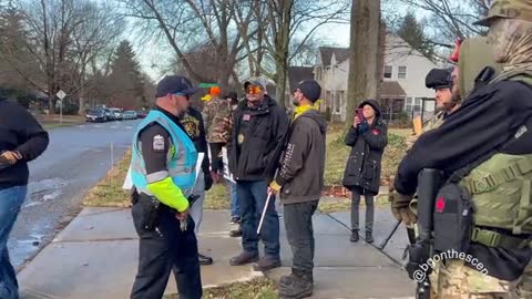 Several armed individuals show up at the protest Columbus