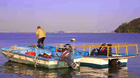 Fisherman Repairing a Ship at a Port in Incheon, South Korea, Oct. 29, 2023