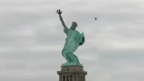 Statue of Liability - Funny Statue of Liberty Dancing & Bending