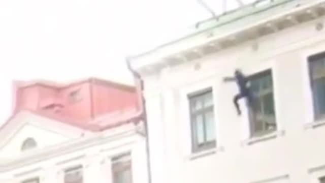 A man jumps from a balcony 😅