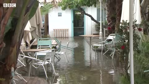 Severe flooding hits Spain's east coast after record rainfall - BBC News