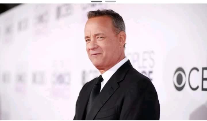 Tom Hanks reviews Biden year of Successes