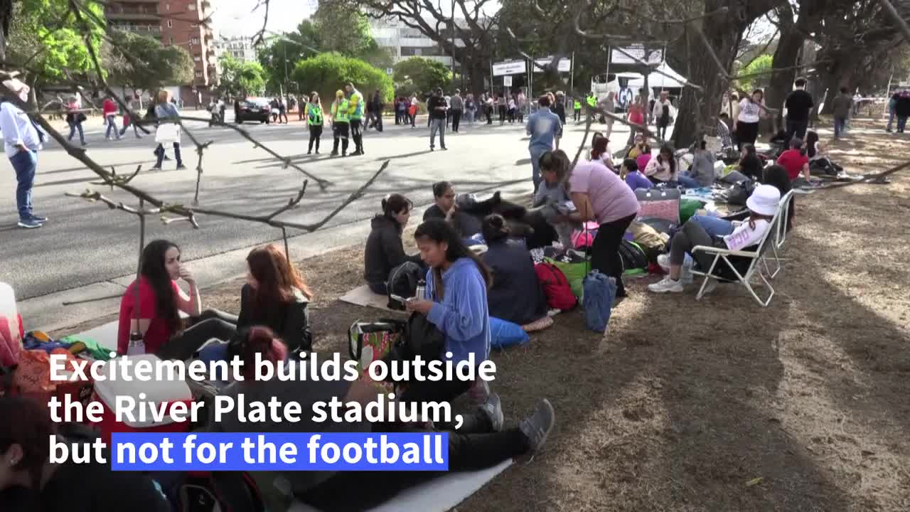 BTS fans camp out to see superstar Jin perform with Coldplay | AFP