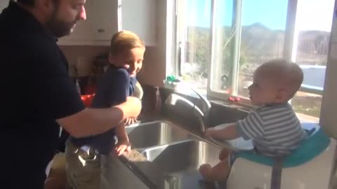 Kid Learns Not To Play With The Garbage Disposal