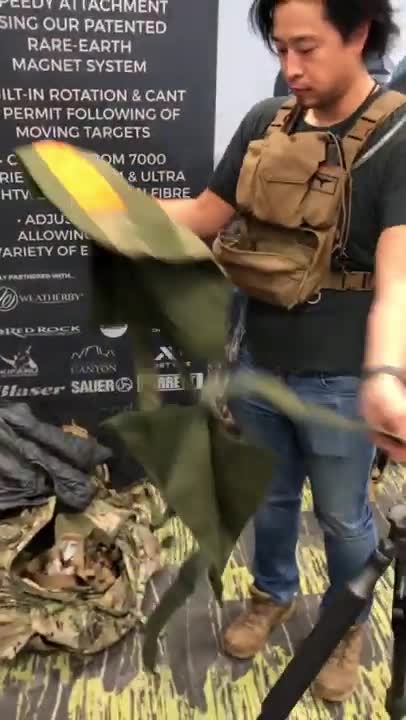 Quick release rifle carrier from paladin at the 2019 SCI show.