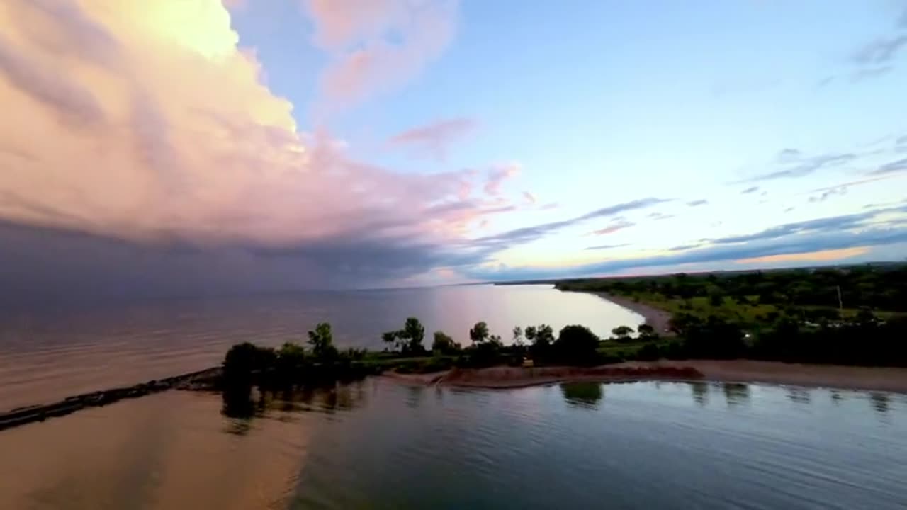 Boat races to beat storm to the safety of the harbour at sunset