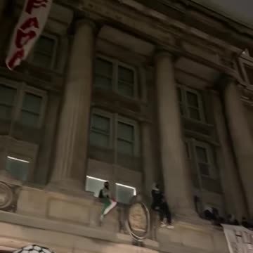 An INTIFADA flag is hung from Hamilton Hall