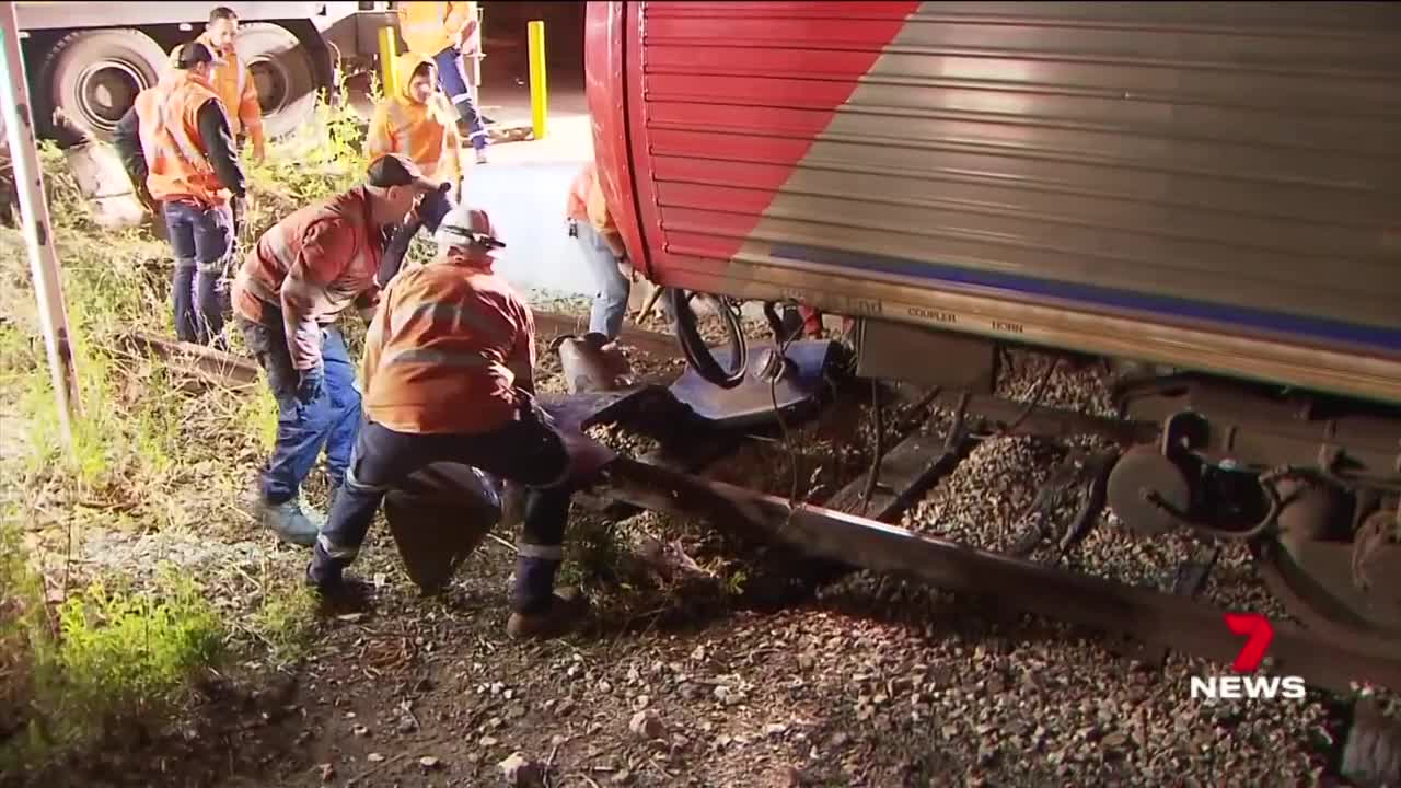 Passenger train derails and crashes through barrier at Grange _ 7NEWS