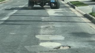 Chevy Driver Ignoring Tire Problem