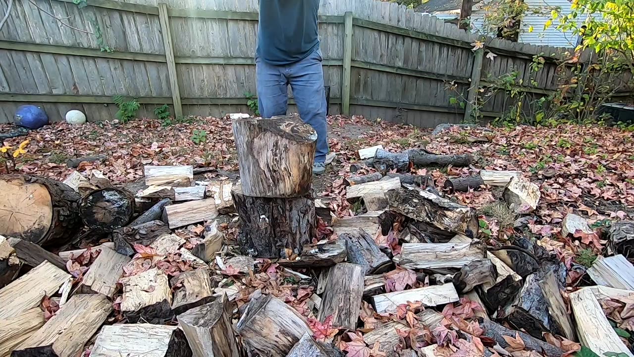 Hand splitting firewood