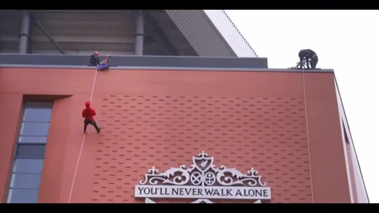 Footballers going down a stadium