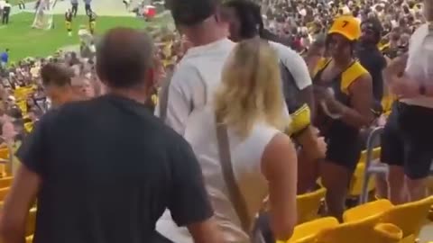 Two guys' fighting at stadium