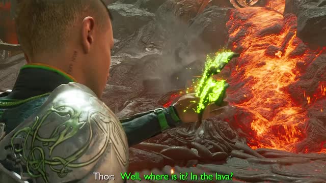 Atreus puts hand in lava God of War Ragnarök