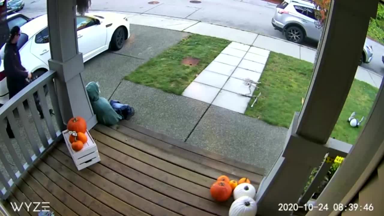 Man Tumbles Over Snowy Stairs While Going Into His House, Caught On Security Cam