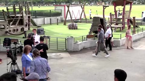 Shocked residents lay white roses at Annecy playground