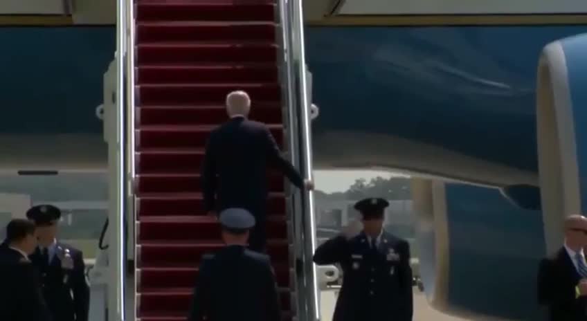 What fell out of Biden while he was boarding Air Force One today?