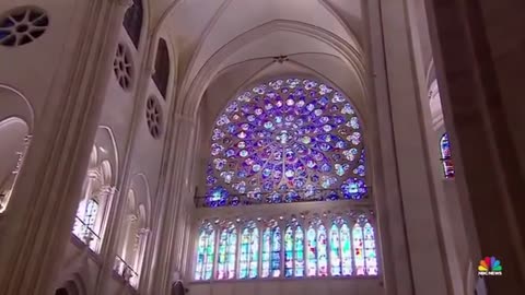 Workers who helped rebuild Notre Dame Cathedral were invited