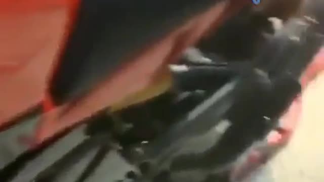 The mouse enters the motorcycle exhaust pipe
